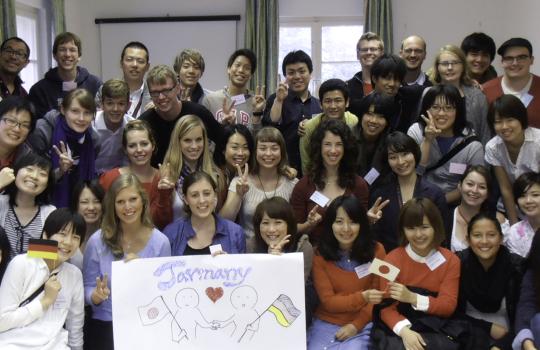 Japanese and German pupils posing for a group photo